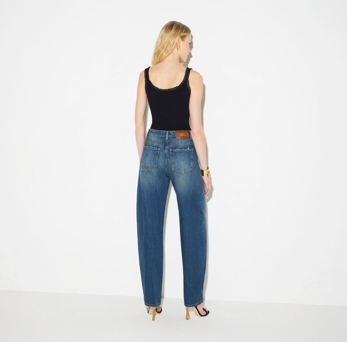 Balloon jeans with jewel buttons